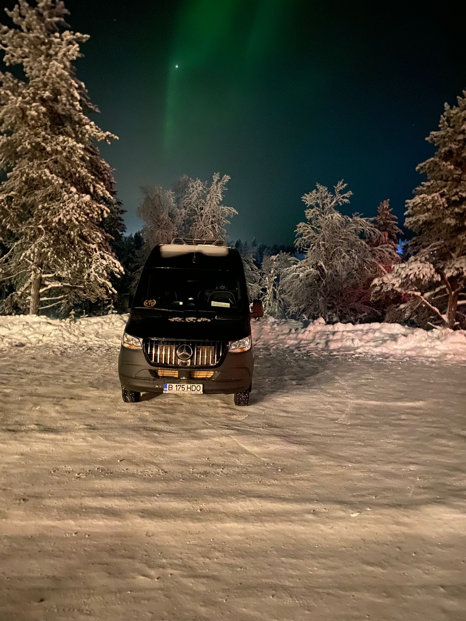 Vaffe Invest minibus under the Northern Lights